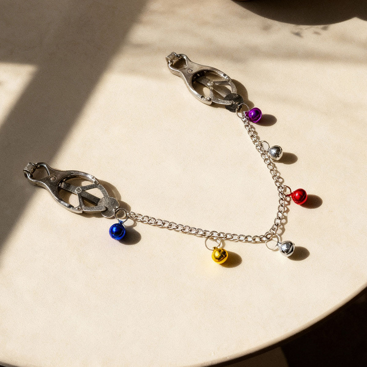 Chaîne et cloches Pinces à mamelons